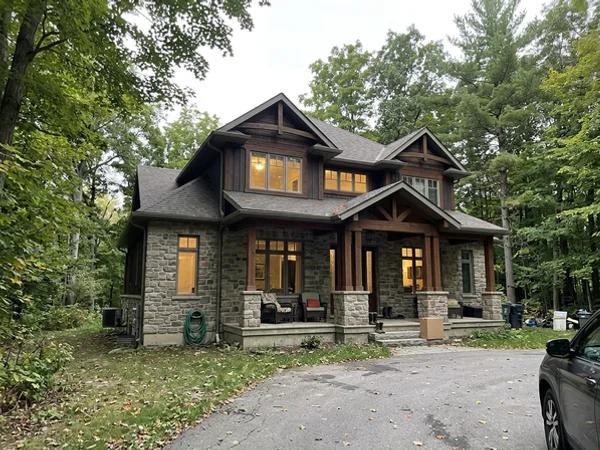 After: luxury Craftsman estate home in Ancaster at dusk
