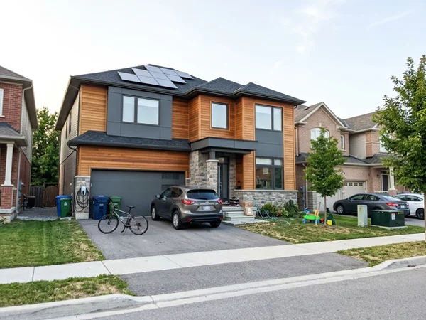After: Net Zero Ready custom home in Alton Village at dusk