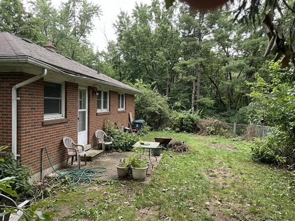 Before: 1950s bungalow on a deep Aldershot lot backing onto a creek ravine